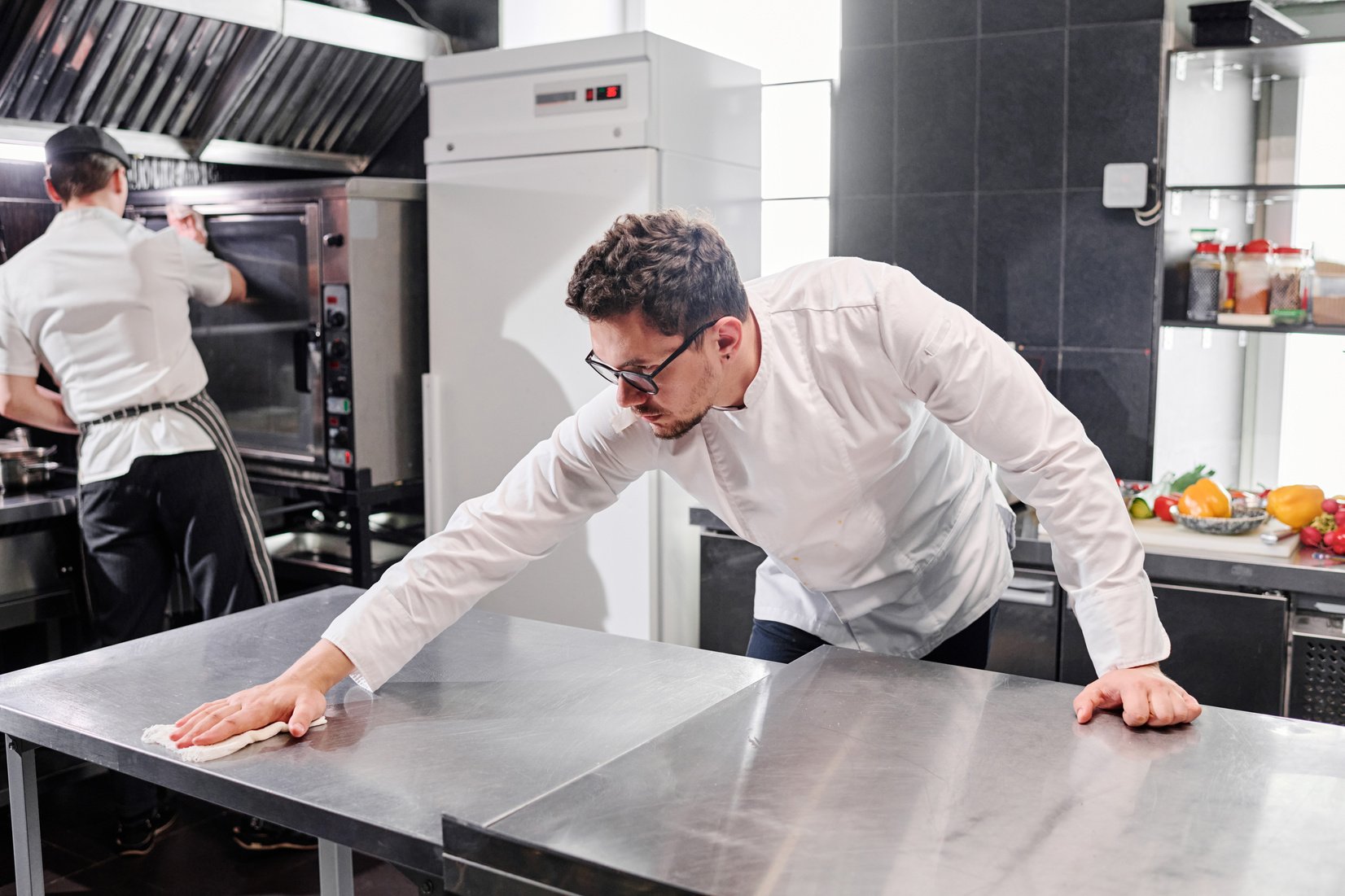 Staff Cleaning Kitchen after Work